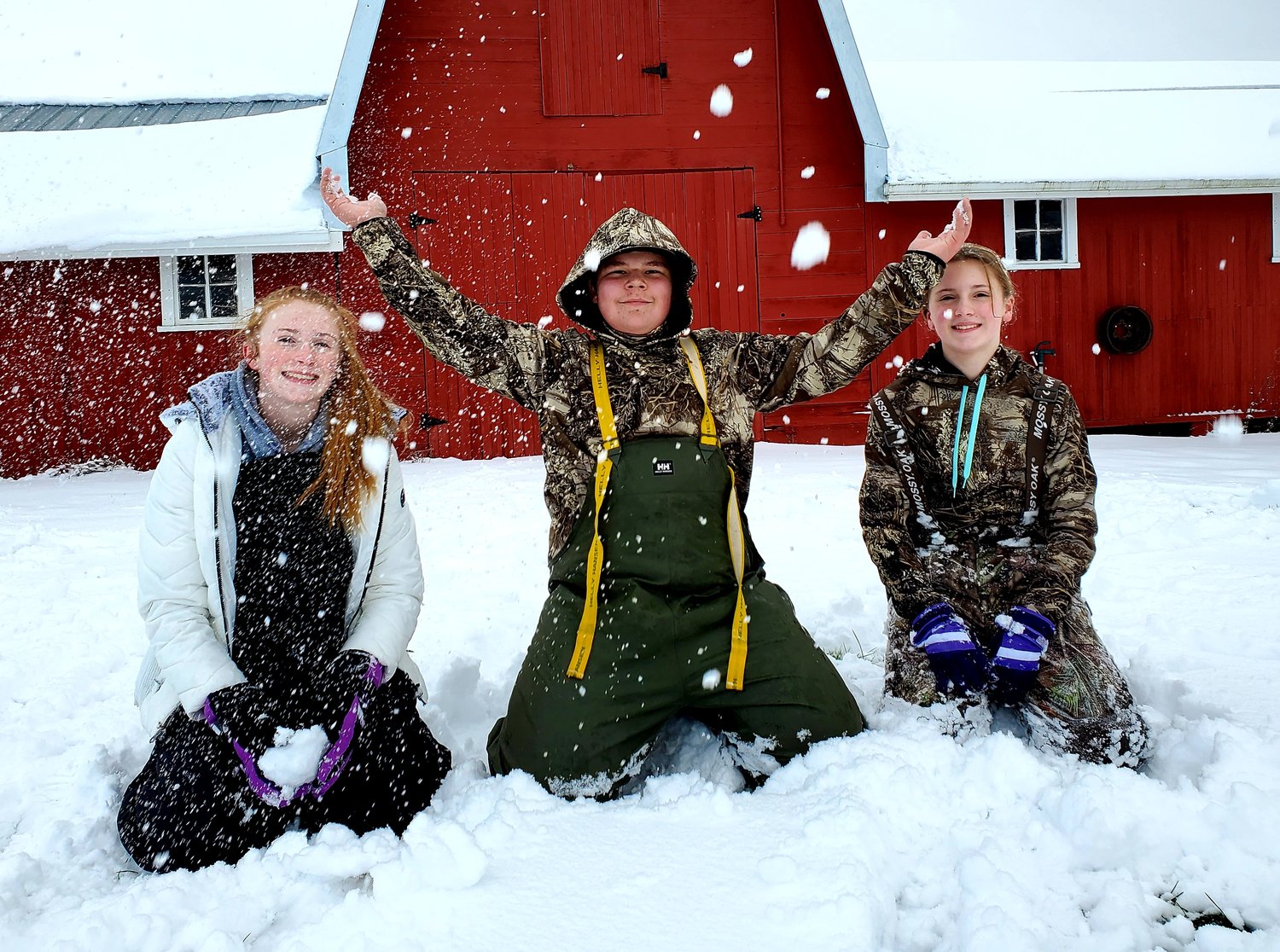 From left to right, Amyah, Bryson and Rayah are pictured enjoying the snow in Winlock in this photograph by their mother, Tara Middleton.